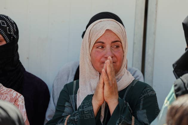 Hebron West Bank Home Demolition A Palestinian woman stands during a home demolition operation in Al-Deirat, south of Hebron, occupied West Bank on July 14, 2026. Israeli forces demolish the home of Osama Masaaf on the grounds that it lacked an Israeli-issued building permit, displacing a Palestinian family of eight. Hebron West Bank Palestinian Territories Copyright: xMosabxShawerx