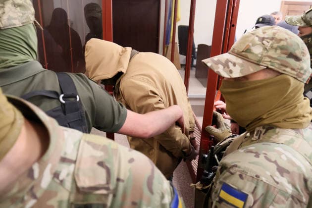 RECORD DATE NOT STATED Court officers escort 33-year-old Defence Intelligence of Ukraine (HUR) officer Vladyslav Reut, a suspect in the murder case of Anastasiia Berezovska, out of the courtroom after the Pecherskyi District Court in Kyiv ordered his pretrial detention for 60 days without the right to post bail, Kyiv, Ukraine, on July 9, 2026. Two people have been detained in connection with the murder investigation: former law enforcement officer Vitalii Zhykovych and serving HUR officer Vladyslav Reut. Thirty-nine-year-old Ukrainian citizen Anastasiia Berezovska had been placed on an international wanted list in connection with an alleged attempt to arrange the killing of the family of sanctioned businessman Vadym Yermolaiev in the Principality of Monaco (Photo  Copyright: xPavloxBahmutx