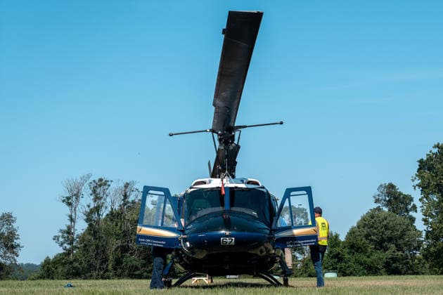 July 14, 2026, Washington, Dc, United States: Mechanics work on a helicopter from the US Air ForceÃ¢â‚¬â ¢s 1st Helicopter Squadron after it made a precautionary landing on an underground reservoir in Northwest Washington, D.C. on July 14, 2026. Washington United States  - ZUMAl312 20260714_znp_l312_013 Copyright: xAndrewxLeydenx