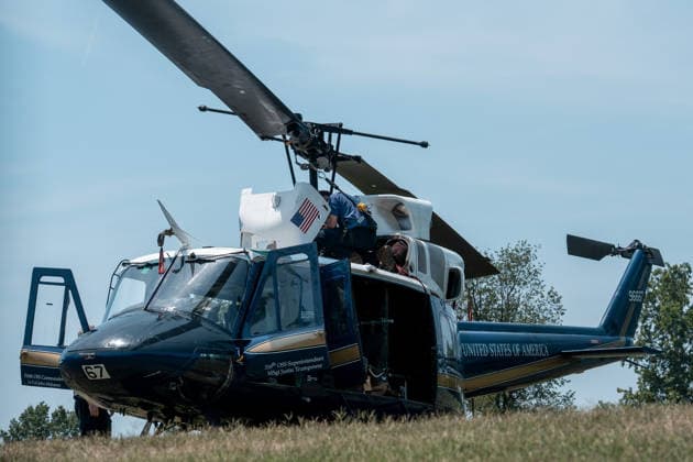 July 14, 2026, Washington, Dc, United States: Mechanics work on a helicopter from the US Air ForceÃ¢â‚¬â ¢s 1st Helicopter Squadron after it made a precautionary landing on an underground reservoir in Northwest Washington, D.C. on July 14, 2026. Washington United States  - ZUMAl312 20260714_znp_l312_014 Copyright: xAndrewxLeydenx