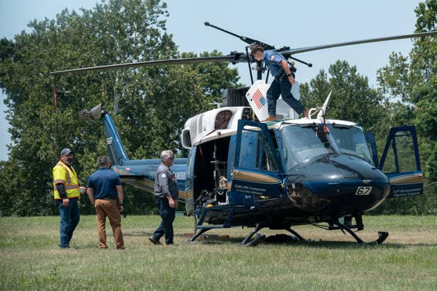 July 14, 2026, Washington, Dc, United States: Mechanics work on a helicopter from the US Air ForceÃ¢â‚¬â ¢s 1st Helicopter Squadron after it made a precautionary landing on an underground reservoir in Northwest Washington, D.C. on July 14, 2026. Washington United States  - ZUMAl312 20260714_znp_l312_017 Copyright: xAndrewxLeydenx