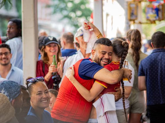 July 14, 2026, New York, New York, USA: Two Spain supporters among a crowd of French fans erupts in celebration as Spain scores, at a Soho bar in New York City where fans have gathered to watch the FIFA semifinal between France and Spain. New York USA - ZUMAc266 20260714_znp_c266_009 Copyright: xCarlosxChiossonex