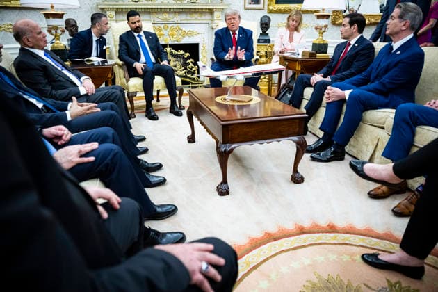 United States President Donald J Trump (R) during a meeting with Iraqi Prime Minister Ali al-Zaidi (L) in the Oval Office of the White House in Washington, DC, USA, 14 July 2026. This is Ali al-Zaidi’s first foreign trip since he took office in May 2026. Copyright: xGraemexSloanx xPoolxviaxCNPx MediaPunchx