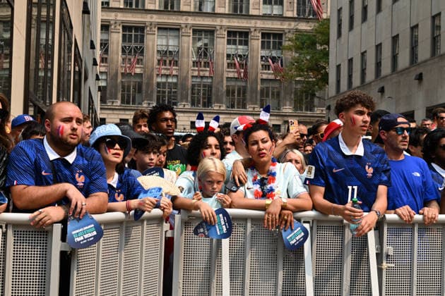 July 14, 2026, New York, New York, USA: July 14, 2026 - New York, NY, USA - New Yorkers and tourists supporting Spain and France in the semi-final match of the World Cup gather in Rockefeller Center for a watch party. Despite the high heat and sun the area was packed. The promising run to the final for France and Mbappe ends with SpainÃ¢â‚¬â ¢s win 2-0. The fans were on the pitch and in the Channel Gardens. (Andrea RENAULT Zuma Press) New York USA - ZUMAg115 20260714_faf_g115_014 Copyright: xAndreaxRenaultx