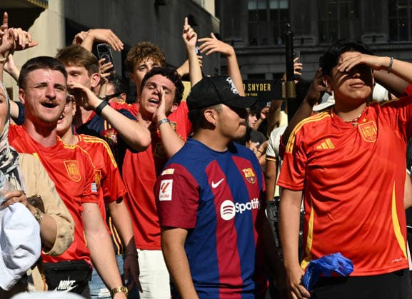 July 14, 2026, New York, New York, USA: July 14, 2026 - New York, NY, USA - New Yorkers and tourists supporting Spain and France in the semi-final match of the World Cup gather in Rockefeller Center for a watch party. Despite the high heat and sun the area was packed. The promising run to the final for France and Mbappe ends with SpainÃ¢â‚¬â ¢s win 2-0. The fans were on the pitch and in the Channel Gardens. (Andrea RENAULT Zuma Press) New York USA  - ZUMAg115 20260714_faf_g115_015 Copyright: xAndreaxRenaultx