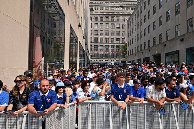 July 14, 2026, New York, New York, USA: July 14, 2026 - New York, NY, USA - New Yorkers and tourists supporting Spain and France in the semi-final match of the World Cup gather in Rockefeller Center for a watch party. Despite the high heat and sun the area was packed. The promising run to the final for France and Mbappe ends with SpainÃ¢â‚¬â ¢s win 2-0. The fans were on the pitch and in the Channel Gardens. (Andrea RENAULT Zuma Press) New York USA - ZUMAg115 20260714_faf_g115_016 Copyright: xAndreaxRenaultx