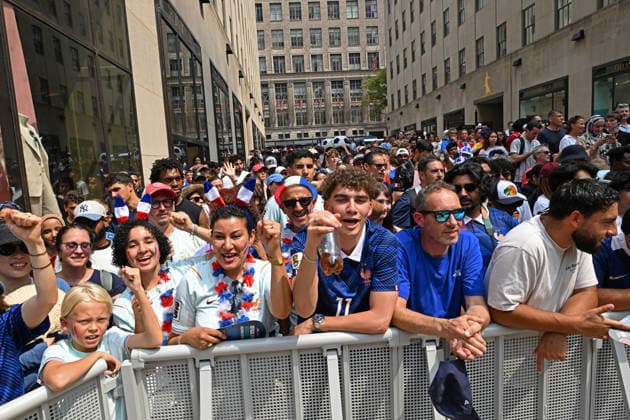 July 14, 2026, New York, New York, USA: July 14, 2026 - New York, NY, USA - New Yorkers and tourists supporting Spain and France in the semi-final match of the World Cup gather in Rockefeller Center for a watch party. Despite the high heat and sun the area was packed. The promising run to the final for France and Mbappe ends with SpainÃ¢â‚¬â ¢s win 2-0. The fans were on the pitch and in the Channel Gardens. (Andrea RENAULT Zuma Press) New York USA  - ZUMAg115 20260714_faf_g115_022 Copyright: xAndreaxRenaultx