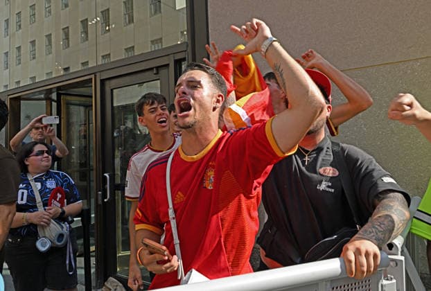 July 14, 2026, New York, New York, USA: July 14, 2026 - New York, NY, USA - New Yorkers and tourists supporting Spain and France in the semi-final match of the World Cup gather in Rockefeller Center for a watch party. Despite the high heat and sun the area was packed. The promising run to the final for France and Mbappe ends with SpainÃ¢â‚¬â ¢s win 2-0. The fans were on the pitch and in the Channel Gardens. (Andrea RENAULT Zuma Press) New York USA  - ZUMAg115 20260714_faf_g115_023 Copyright: xAndreaxRenaultx