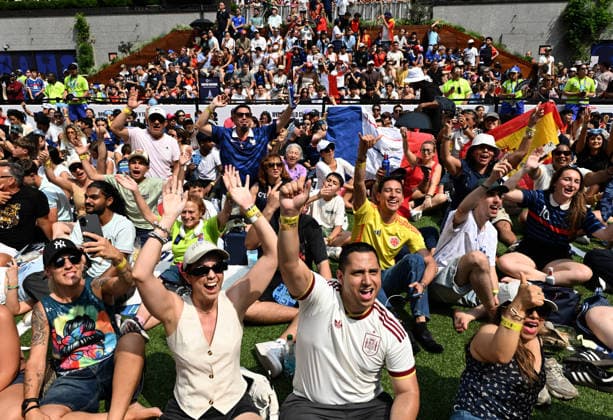July 14, 2026, New York, New York, USA: July 14, 2026 - New York, NY, USA - New Yorkers and tourists supporting Spain and France in the semi-final match of the World Cup gather in Rockefeller Center for a watch party. Despite the high heat and sun the area was packed. The promising run to the final for France and Mbappe ends with SpainÃ¢â‚¬â ¢s win 2-0. The fans were on the pitch and in the Channel Gardens. (Andrea RENAULT Zuma Press) New York USA - ZUMAg115 20260714_faf_g115_026 Copyright: xAndreaxRenaultx