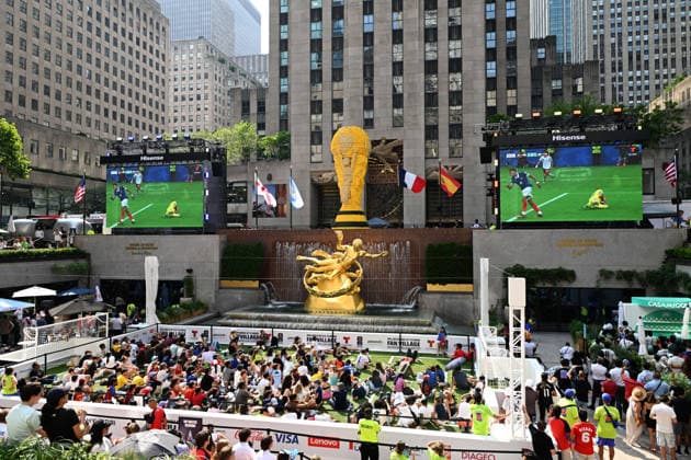July 14, 2026, New York, New York, USA: July 14, 2026 - New York, NY, USA - New Yorkers and tourists supporting Spain and France in the semi-final match of the World Cup gather in Rockefeller Center for a watch party. Despite the high heat and sun the area was packed. The promising run to the final for France and Mbappe ends with SpainÃ¢â‚¬â ¢s win 2-0. The fans were on the pitch and in the Channel Gardens. (Andrea RENAULT Zuma Press) New York USA - ZUMAg115 20260714_faf_g115_028 Copyright: xAndreaxRenaultx