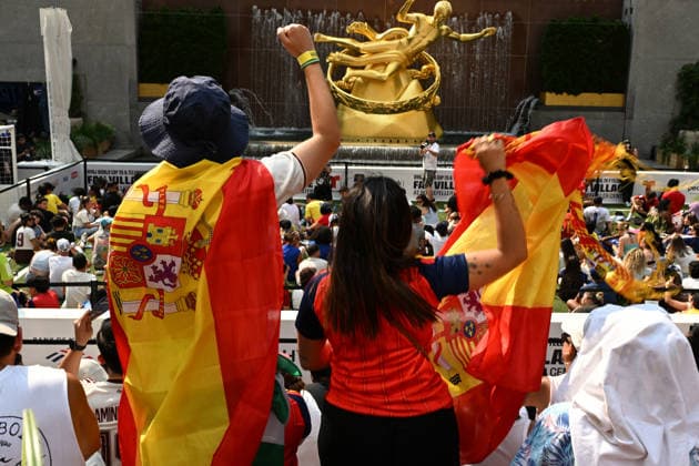 July 14, 2026, New York, New York, USA: July 14, 2026 - New York, NY, USA - New Yorkers and tourists supporting Spain and France in the semi-final match of the World Cup gather in Rockefeller Center for a watch party. Despite the high heat and sun the area was packed. The promising run to the final for France and Mbappe ends with SpainÃ¢â‚¬â ¢s win 2-0. The fans were on the pitch and in the Channel Gardens. (Andrea RENAULT Zuma Press) New York USA  - ZUMAg115 20260714_faf_g115_032 Copyright: xAndreaxRenaultx