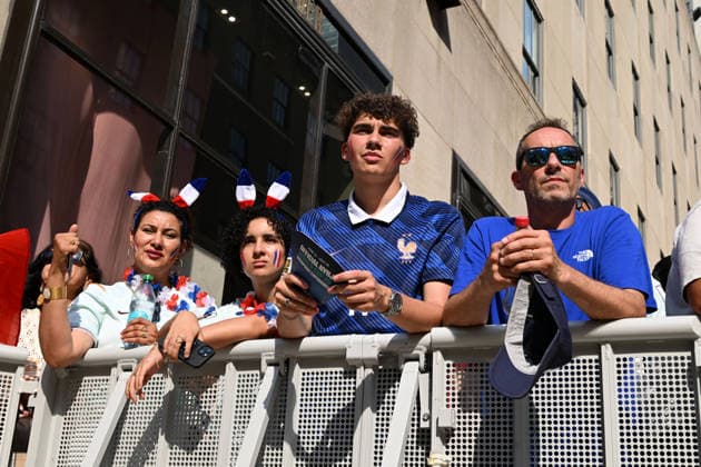 July 14, 2026, New York, New York, USA: July 14, 2026 - New York, NY, USA - New Yorkers and tourists supporting Spain and France in the semi-final match of the World Cup gather in Rockefeller Center for a watch party. Despite the high heat and sun the area was packed. The promising run to the final for France and Mbappe ends with SpainÃ¢â‚¬â ¢s win 2-0. The fans were on the pitch and in the Channel Gardens. (Andrea RENAULT Zuma Press) New York USA  - ZUMAg115 20260714_faf_g115_034 Copyright: xAndreaxRenaultx