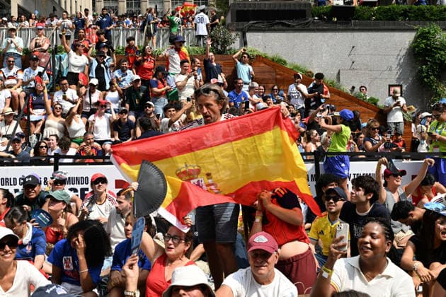 July 14, 2026, New York, New York, USA: July 14, 2026 - New York, NY, USA - New Yorkers and tourists supporting Spain and France in the semi-final match of the World Cup gather in Rockefeller Center for a watch party. Despite the high heat and sun the area was packed. The promising run to the final for France and Mbappe ends with SpainÃ¢â‚¬â ¢s win 2-0. The fans were on the pitch and in the Channel Gardens. (Andrea RENAULT Zuma Press) New York USA  - ZUMAg115 20260714_faf_g115_038 Copyright: xAndreaxRenaultx