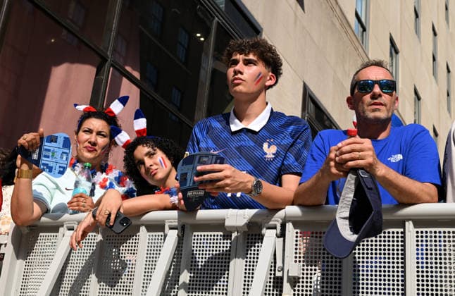 July 14, 2026, New York, New York, USA: July 14, 2026 - New York, NY, USA - New Yorkers and tourists supporting Spain and France in the semi-final match of the World Cup gather in Rockefeller Center for a watch party. Despite the high heat and sun the area was packed. The promising run to the final for France and Mbappe ends with SpainÃ¢â‚¬â ¢s win 2-0. The fans were on the pitch and in the Channel Gardens. (Andrea RENAULT Zuma Press) New York USA - ZUMAg115 20260714_faf_g115_041 Copyright: xAndreaxRenaultx