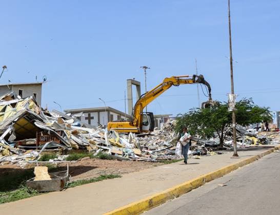 July 14, 2026, La Guaira, Venezuela (Bolivarian Republic of: PLAYA GRANDE, LA GUAIRA, VENEZUELA Ã¢â‚¬ JULY 14, 2026: Excavators and civil carry out controlled demolition and debris removal operations in the coastal community of Playa Grande, one of the areas hardest hit by the earthquake that struck northern Venezuela 20 days earlier. The operations have entered the recovery phase, focusing on clearing major roads blocked by collapsed residential buildings to restore access and mobility for residents as reconstruction efforts continue. JNA Press. La Guaira Venezuela (Bolivarian Republic of  - ZUMAq101 20260714_zna_q101_186 Copyright: xMarioxFloresx