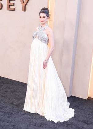July 14, 2026, Bronx, New York, USA: Anne Hathaway wearing dress by Prada attends premiere of The Odyssey at AMC Lincoln Square in New York, NY on July 14, 2026. Bronx USA  - ZUMAr339 20260714_znp_r339_157 Copyright: xLevxRadinx