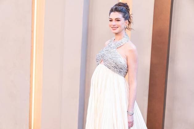 July 14, 2026, Bronx, New York, USA: Anne Hathaway wearing dress by Prada attends premiere of The Odyssey at AMC Lincoln Square in New York, NY on July 14, 2026. Bronx USA - ZUMAr339 20260714_znp_r339_161 Copyright: xLevxRadinx