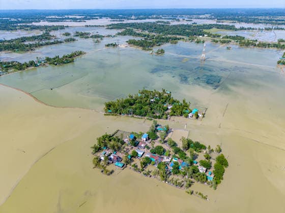 Aftermath Of Floodwaters In Chattogram An expansive aerial view reveals the scale of waterlogging across villages, with rising and receding waters reshaping the landscape in Banshkhali, Chattogram, Bangladesh, on July 14, 2026. Flood waters in Banshkhali and Satkania in Chittagong are slowly receding, while many areas remain knee-deep in water. As the water recedes, collapsed mud houses, damaged structures, destroyed brick kilns and severely damaged agricultural land are becoming visible, displacing thousands of people. Chattogram Bangladesh  Copyright: xZakirxHossainx originalFilename: hossain-notitle260714_npx4u.jpg