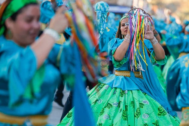 July 14, 2026, La Tirana, Chile: A woman dances with a tampone in a suit representing a gypsy. In the town of La Tirana, located 78 km from the city of Iquique, in northern Chile, the traditional and massive religious festival for La Virgen del Carmen del Tamarugal was held. Where approximately 500 thousand pilgrims arrived to enjoy this religious festival, where thousands of faithful danced to the chinita with their colorful costumes. This tradition in the town of La Tirana makes it the most popular religious festival in Chile, where this year 100 years are commemorated since the Church crowned the Virgen del Carmen as patron saint of Chile. La Tirana Chile  - ZUMAs197 20260714_aaa_s197_147 Copyright: xSebastianxNancox