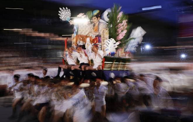 Hakata Gion Yamakasa Festival in Fukuoka People run while carrying a yamakasa decorated float along a 5-kilometer course during the annual Hakata Gion Yamakasa Festival in the early morning of July 15, 2026, in the southwestern Japan city of Fukuoka.  A14AA0005623191P