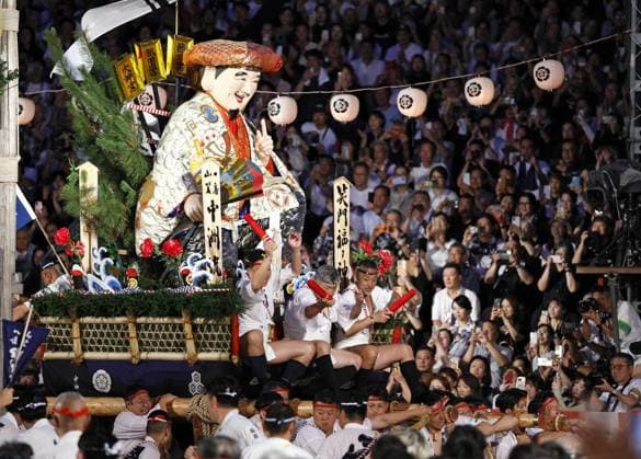 Hakata Gion Yamakasa Festival in Fukuoka People run while carrying a yamakasa decorated float along a 5-kilometer course during the annual Hakata Gion Yamakasa Festival in the early morning of July 15, 2026, in the southwestern Japan city of Fukuoka.  A14AA0005623194P
