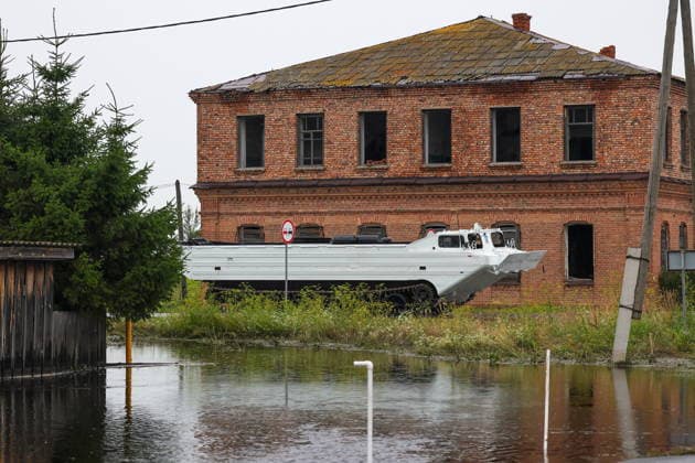 RUSSIA, SVERDLOVSK REGION - JULY 15, 2026: An all-terrain vehicle travels over the flood-hit village of Kilachevskoye, southwest of Irbit. Donat Sorokin TASS  95061258