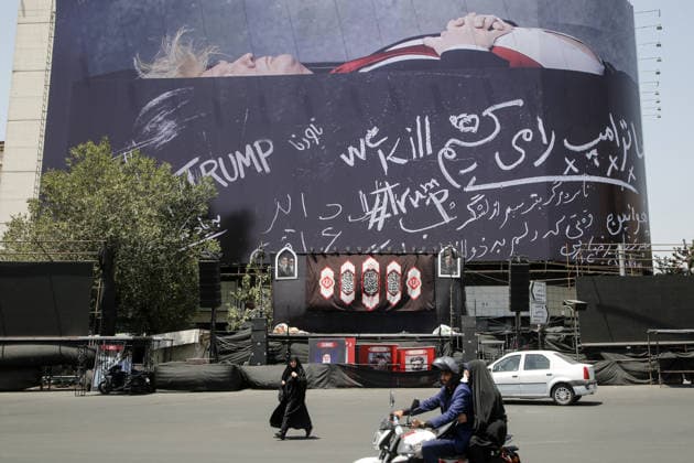 Giant billboard depicting Donald Trump hung in Tehran s Revolution Square TEHRAN, IRAN - JULY 15 : A view of a billboard depicting US President Donald Trump lying in a black coffin made of concrete barriers is hung at Enghelab (Revolution) Square with slogans written on the coffin walls , referring to the chalk-written barriers used at the ceremony for the late Iranian leader Ali Khamenei at the Imam Khomeini Musalla Mosque, on July 15, 2026 in Tehran, Iran. Fatemeh Bahrami Anadolu Tehran Iran. Editorial use only. Please get in touch for any other usage.  Copyright: x2026xAnadoluxFatemehxBahramix