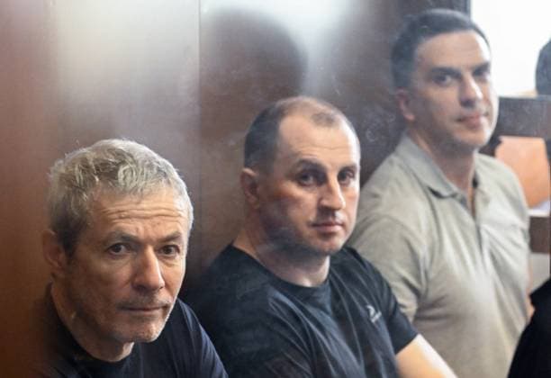 Russia Rusagro Founder Fraud Trial 9205861 15.07.2026 Founder of Russian agricultural giant Rusagro Group Vadim Moshkovich, former Tambov Region Governor Sergei Ivanov and former Rusagro Group CEO Maxim Basov, defendants in the Rusagro corruption case, are seen inside a defendant s glass cage during a hearing at the Zamoskvoretsky District Court in Moscow, Russia. Mikhail Voskresenskiy Sputnik Moscow Russia  Copyright: xMikhailxVoskresenskiyx