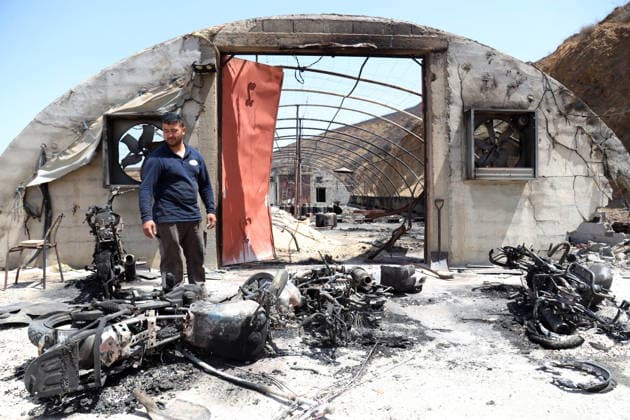 Mountain fires in Bejaia and Setif caused property damage in the village of Talat Izar Beni Maouche, in Bejaia, Algeria, on July 15, 2026, Due to the recent fires, according to a report from civil protection, the fires are under control. Photo by Billel Bensalem, APP, Bejaia, Algeria Copyright: xAPPxAlgeriexPressxPhotosxBillelxBensalemx xAPPx IMG_6176