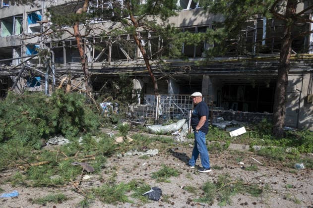 Russian guided bomb strike damages industrial zone in Kharkiv KHARKIV, UKRAINE - JULY 15: The aftermath of a strike by a Russian guided aerial bomb is seen in an industrial zone in Kharkiv, Ukraine, on July 15, 2026. The attack caused severe damage to industrial buildings housing woodworking, footwear and clothing manufacturing facilities, as well as other civilian enterprises. Seven vehicles parked near the impact site were also damaged. According to local authorities, eight civilians were injured in the strike. Men aged 44, 49, 50 and 57, along with women aged 31, 51 and 60, were hospitalized with injuries of varying severity. A 51-year-old man who suffered cuts from shattered glass received medical treatment at the scene. Serhii Masin  Copyright: x2026xAnadoluxSerhiixMasinx