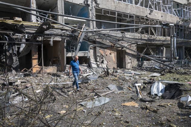 Russian guided bomb strike damages industrial zone in Kharkiv KHARKIV, UKRAINE - JULY 15: The aftermath of a strike by a Russian guided aerial bomb is seen in an industrial zone in Kharkiv, Ukraine, on July 15, 2026. The attack caused severe damage to industrial buildings housing woodworking, footwear and clothing manufacturing facilities, as well as other civilian enterprises. Seven vehicles parked near the impact site were also damaged. According to local authorities, eight civilians were injured in the strike. Men aged 44, 49, 50 and 57, along with women aged 31, 51 and 60, were hospitalized with injuries of varying severity. A 51-year-old man who suffered cuts from shattered glass received medical treatment at the scene. Serhii Masin  Copyright: x2026xAnadoluxSerhiixMasinx