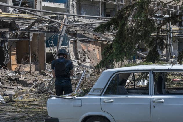 Russian guided bomb strike damages industrial zone in Kharkiv KHARKIV, UKRAINE - JULY 15: The aftermath of a strike by a Russian guided aerial bomb is seen in an industrial zone in Kharkiv, Ukraine, on July 15, 2026. The attack caused severe damage to industrial buildings housing woodworking, footwear and clothing manufacturing facilities, as well as other civilian enterprises. Seven vehicles parked near the impact site were also damaged. According to local authorities, eight civilians were injured in the strike. Men aged 44, 49, 50 and 57, along with women aged 31, 51 and 60, were hospitalized with injuries of varying severity. A 51-year-old man who suffered cuts from shattered glass received medical treatment at the scene. Serhii Masin  Copyright: x2026xAnadoluxSerhiixMasinx