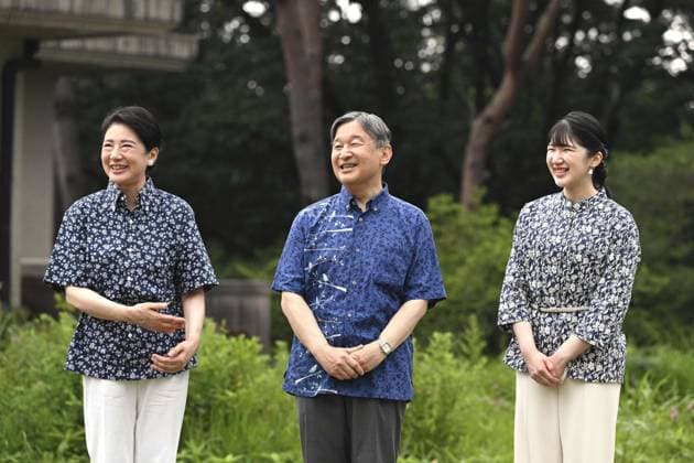 Japan imperial family at villa in Tochigi Pref. Japan s Emperor Naruhito, Empress Masako (L) and their daughter, Princess Aiko, greet the press during their stroll on the premises of an imperial villa in Nasu in Tochigi Prefecture, north of Tokyo, on July 15, 2026. (Pool photo)  A14AA0005623292P
