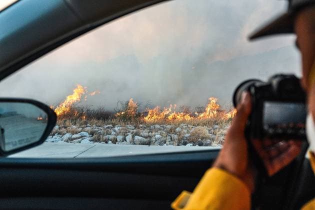 July 15, 2026, Boulevard, California, United States: Fire and smoke are seen along the road..The Thorn Fire burns near Buckthorn Trail and Clover Trail in the Boulevard Campo area of southeastern San Diego County on Wednesday, July 15, 2026. Fueled by hot, dry conditions, the wildfire spreads rapidly, prompts evacuation orders and warnings, temporarily closes portions of Interstate 8, and draws a large response from Cal Fire and local agencies. Firefighters on the ground, supported by air tankers and helicopters, work to slow the fire s advance and protect nearby homes and infrastructure as officials monitor changing fire conditions. Boulevard United States  - ZUMAs197 20260715_aaa_s197_309 Copyright: xWaixLeexMichaelxHox