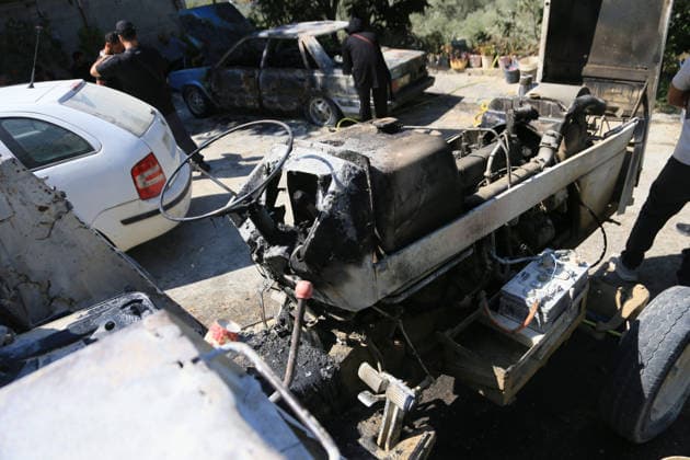 Palestinians inspect vehicles burned in suspected settler attack near Nablus Palestinians inspect a burned car and tractor after they were set on fire by Jewish settlers in the village of Ramin, west of the West Bank city of Nablus, on July 16, 2026. Photo by Mohammed Nasser apaimages Nablus West Bank Palestinian Territory 160726_Nablus_MN_00(7) Copyright: xapaimagesxMohammedxNasserx xapaimagesx