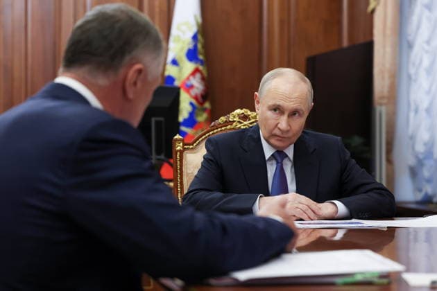 RUSSIA, MOSCOW - JULY 16, 2026: Vladimir Putin, President of Russia, attends a meeting with Deputy Prime Minister Marat Khusnullin at the Moscow Kremlin. Gavriil Grigorov Russian Presidential Press and Information Office TASS  95101687