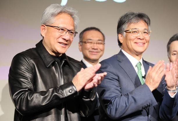 July 16, 2026, Tokyo, Japan - American AI chip maker Nvidia founfer and CEO Jensen Huang (L) smiles with Japanese computer giant Fujitsu president Takahito Tokita (R) at a press conference as Japanese three robotics companies, Fanuc, Yaskawa Electric and Kawasaki Heavy Industries begin business collaboration with Nvidia and Fujitsu in the field of the physical AI in Tokyo on Thursday, July 16, 2026. (photo by Yoshio Tsunoda AFLO)  aflo_338196836