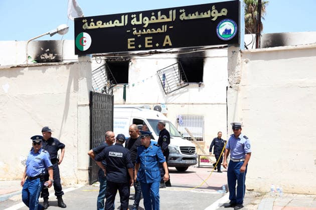 News Themen der Woche KW29 (260716) -- ALGIERS, July 16, 2026 -- Police officers stand guard after a fire ravaged an orphanage in Algiers, Algeria, on July 16, 2026. Eleven children were killed and 19 others injured in a fire that broke out Thursday morning at an orphanage in the Algerian capital Algiers, authorities said in a report. (Photo by Xinhua) (SpotNews) ALGERIA-ALGIERS-ORPHANAGE-FIRE BillelxBensalem 