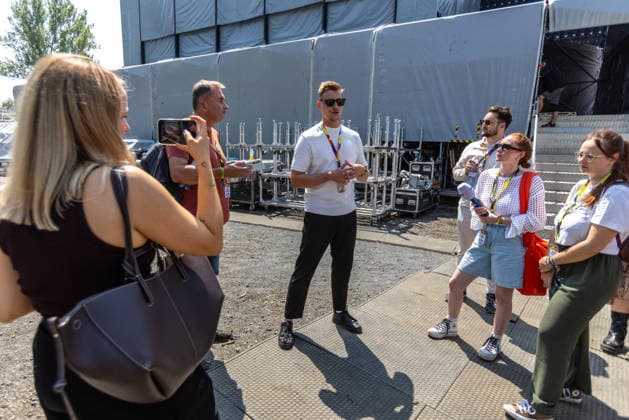 Filip Kostalek, art director of music festival Colours of Ostrava, centre, in Ostrava, Czech Republic, on July 16, 2026. (CTKxPhoto VladimirxPrycek) CTKPhotoP2026071604398  CTKPhotoP2026071604398