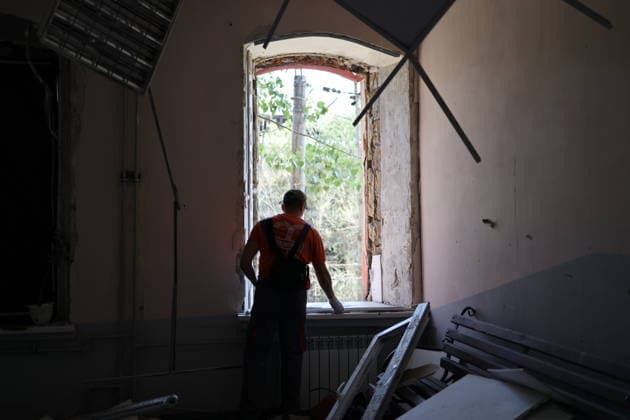 The damaged Odessa Vocational Lyceum of Maritime Transport in Ukraine - 16 Jul 2026 A worker covers damaged windows of the Odessa Professional Lyceum of Maritime Transport on Primorskaya Street with film. A Russian missile attack damaged the Odessa Professional Lyceum of Maritime Transport on Primorskaya Street City authorities reported no casualties. Odessa Ukraine Copyright: xViacheslavxOnyshchenkox xSOPAxImagesx Vonyshchenko(3)