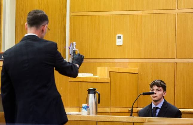 July 16, 2026, Clearwater, Florida, USA: Assistant State Attorney Nash Licona, left, holds the murder weapon as he cross examines the defendant, Stuart Beck, while Beck takes the stand and testifies in his murder trial at the Pinellas County Justice Center on Thursday, July 16, 2026 in Clearwater. Beck is on trial for shooting and killed Michael Conrad. Clearwater USA - ZUMAs70_ 20260716_zan_s70_017 Copyright: xDirkxShaddx