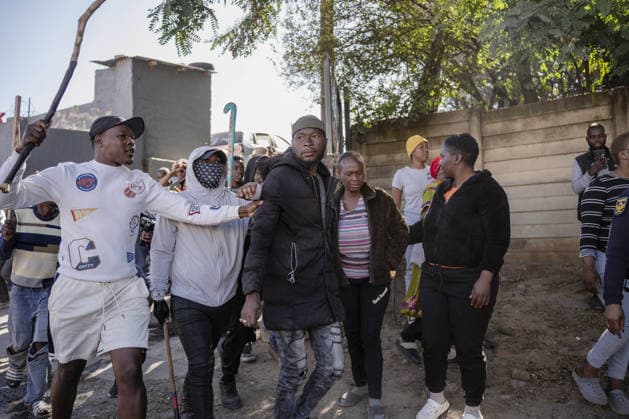 Anti-migrant group holds protest in Johannesburg JOHANNESBURG, SOUTH AFRICA - JULY 16: An anti-migrant group of dozens of people hold a protest in the Alexandra township of Johannesburg, South Africa on July 16, 2026. While some of the demonstrators carried sticks, security forces took precautions along the march route as brief tensions erupted between officers and some of the protesters. Ihsaan Haffejee Anadolu Johannesburg South Africa. Editorial use only. Please get in touch for any other usage.  Copyright: x2026xAnadoluxIhsaanxHaffejeex