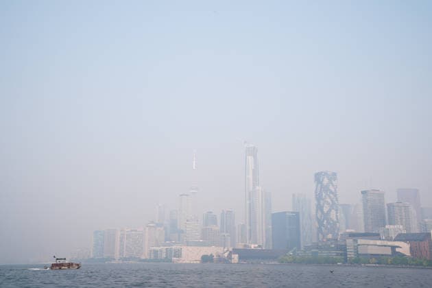 Forest Fires Smoke Blankets Toronto TORONTO, CANADA - JULY 16 : The hazy Toronto skyline is seen as smoke from wildfires continue to impact air quality in Toronto, Ontario on July 16, 2026. Smoke from wildfires in northwestern Ontario has moved into parts of the province, causing very poor air quality and reduced visibility, prompting Environment Canada to issue a high-level air quality alert Wednesday. Mert Alper Dervis Anadolu Ontario Canada. Editorial use only. Please get in touch for any other usage.  Copyright: x2026xAnadoluxMertxAlperxDervisx