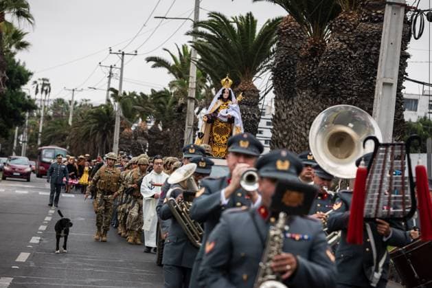 July 16, 2026, Arica, Chile: ARICA, CHILE Ã¢â‚¬ JULY 2026: Chilean soldiers carry an image of the Virgen del Carmen from the foot of the steps into San Marcos Cathedral, where it will remain for worshippers to venerate over the following days, while a Catholic priest looks on. This year marks 100 years since the Church crowned the Virgen del Carmen, Patroness of Chile. Ibar Silva JNA Press. Arica Chile - ZUMAq101 20260716_zna_q101_057 Copyright: xIbarxFelipexSilvaxCanalesx