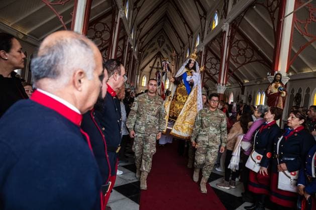 July 16, 2026, Arica, Chile: ARICA, CHILE Ã¢â‚¬ JULY 2026: Chilean soldiers carry an image of the Virgen del Carmen from the foot of the steps into San Marcos Cathedral, where it will remain for worshippers to venerate over the following days, while a Catholic priest looks on. This year marks 100 years since the Church crowned the Virgen del Carmen, Patroness of Chile. Ibar Silva JNA Press. Arica Chile - ZUMAq101 20260716_zna_q101_060 Copyright: xIbarxFelipexSilvaxCanalesx