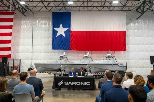 July 16, 2026, Austin, Tx, USA: Texas Governor GREG ABBOTT announces with Saronic CEO DINO MAVROOKAS the expansion to south Texas of the ship and drone boat manufacturer Saronic to a 1,000 acre site at the Port of Brownsville. The Saronic Corsair in the background were the type of drones used to rescue downed U.S. pilots in the Gulf of Oman and attack naval facilities in Iraq. Austin USA  - ZUMAd150 20260716_znp_d150_002 Copyright: xBobxDaemmrichx