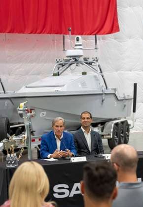 July 16, 2026, Austin, Tx, USA: Texas Governor GREG ABBOTT announces with Saronic CEO DINO MAVROOKAS the expansion to south Texas of the ship and drone boat manufacturer Saronic to a 1,000 acre site at the Port of Brownsville. The Saronic Corsair in the background were the type of drones used to rescue downed U.S. pilots in the Gulf of Oman and attack naval facilities in Iraq. Austin USA  - ZUMAd150 20260716_znp_d150_014 Copyright: xBobxDaemmrichx