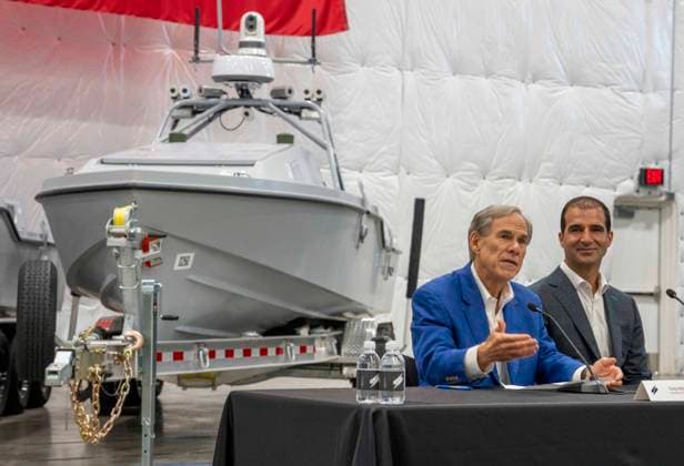 July 16, 2026, Austin, Tx, USA: Texas Governor GREG ABBOTT announces with Saronic CEO DINO MAVROOKAS the expansion to south Texas of the ship and drone boat manufacturer Saronic to a 1,000 acre site at the Port of Brownsville. The Saronic Corsairs in the background were the type of drones used to rescue downed U.S. pilots in the Gulf of Oman and attack naval facilities in Iraq. Austin USA - ZUMAd150 20260716_znp_d150_010 Copyright: xBobxDaemmrichx