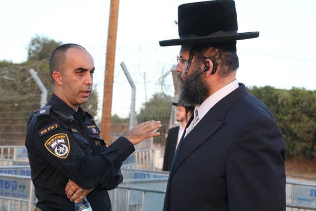 Ultra-Orthodox Jews protest compulsory military service outside Israeli prison KFAR YONA, ISRAEL - JULY 16: Israeli security forces take security measures as demonstrators gather to protest outside the Beit Lid military prison demanding the release of an Ultra-Orthodox (Haredi) youth detained for refusing compulsory military service in Kfar Yona, Israel, on July 16, 2026. Gideon Markowicz Anadolu Kfar Yona Israel. Editorial use only. Please get in touch for any other usage.  Copyright: x2026xAnadoluxGideonxMarkowiczx
