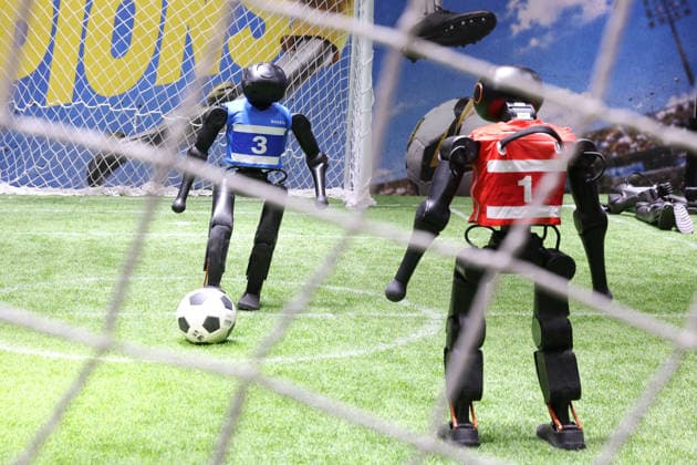 SHANGHAI, CHINA - JULY 17: Humanoid robots compete in a football match during the 2026 World AI Conference and High-Level Meeting on Global AI Governance on July 17, 2026 in Shanghai, China. Themed AI Partnership for a Brighter Future, the event will include more than 140 forums, bringing together 1,400 guests from home and abroad.  Copyright: xChinaxNewsxServicex 111654825228